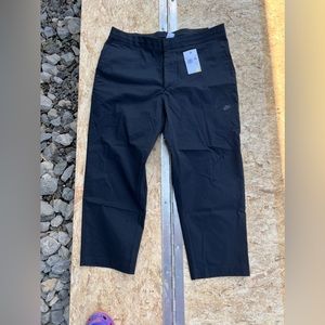 Nike men’s black standard fit taper leg sneaker length size 38 NWT